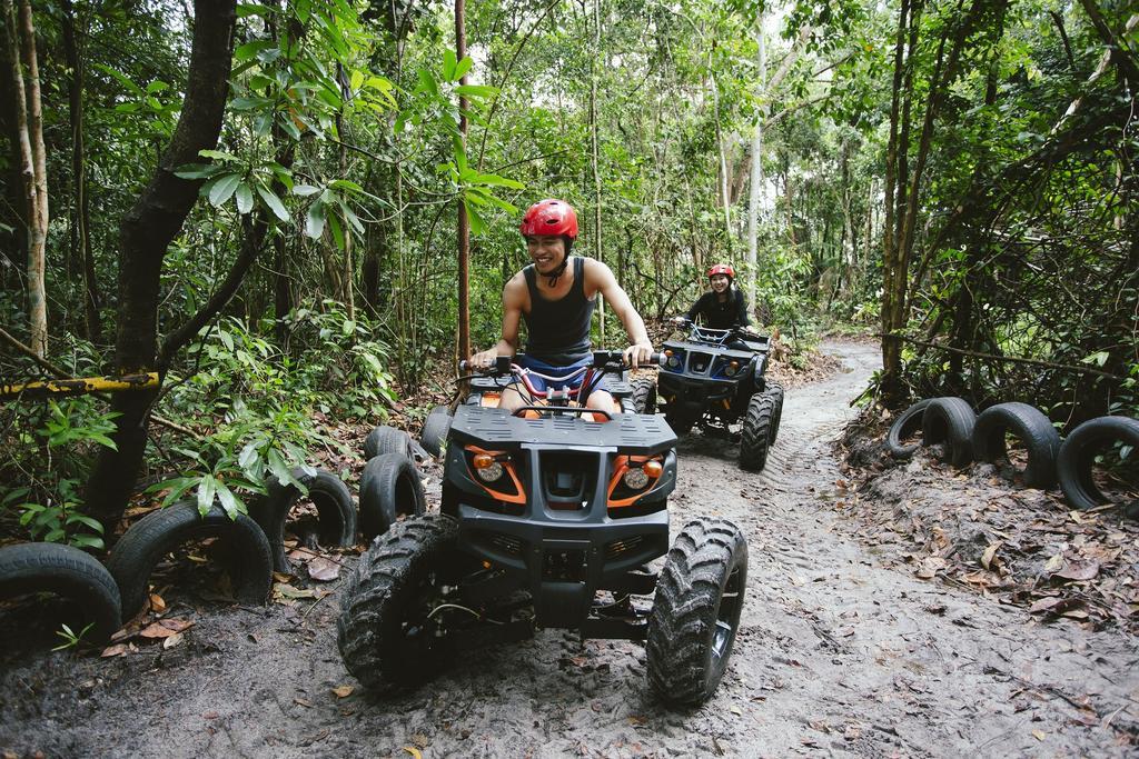 Sand & Sandals Desaru Beach Resort & Spa Exterior photo ATV riding in the jungle