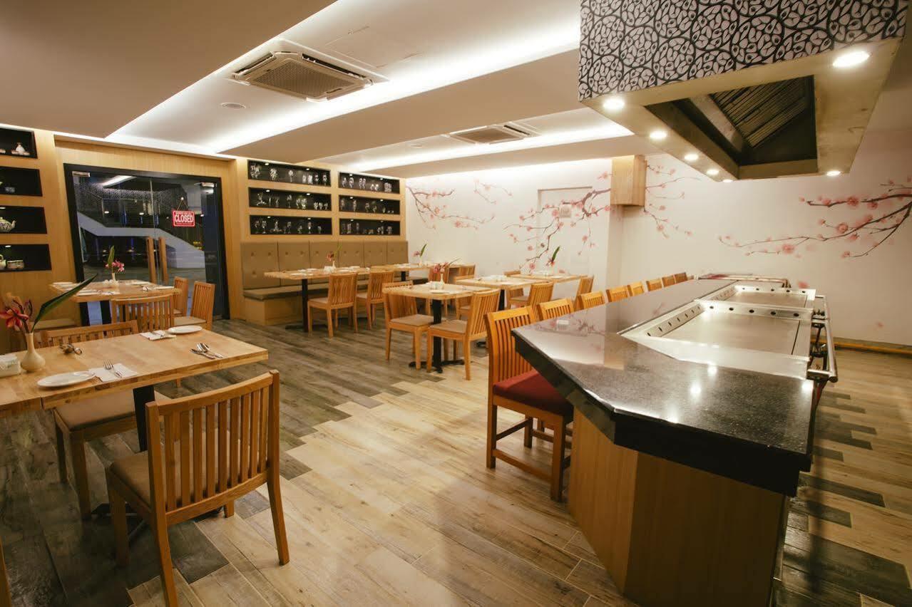 Sand & Sandals Desaru Beach Resort & Spa Exterior photo Interior of a restaurant in Hong Kong